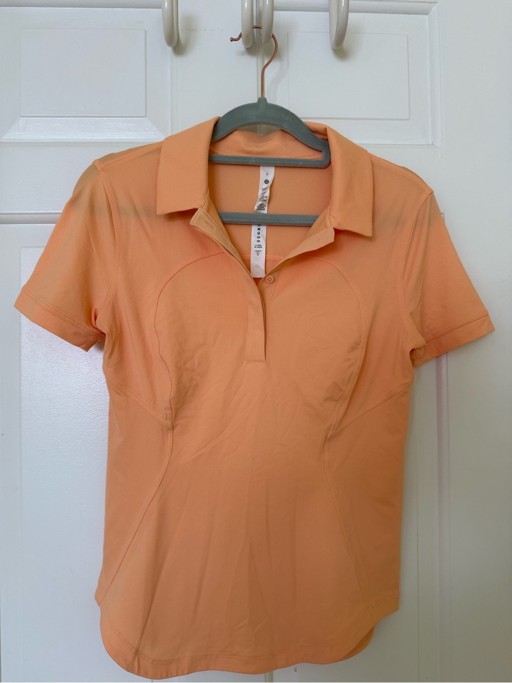 lululemon athletica Quick-Dry Short-Sleeve Polo Shirt Size 2 in Sunny Coral